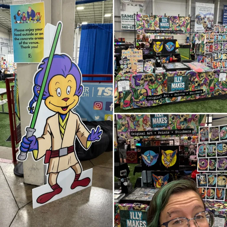 My booth setup, the con mascot Simi, and me in front of my booth.