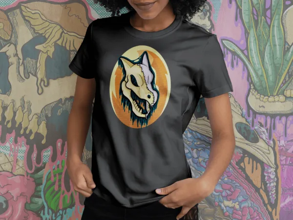 Drippy Aerodactyl Skull tee in black, featuring a melting fossil Pokémon skull with a halftone Old Amber background in bold gothic style.