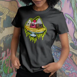 Unisex t-shirt featuring the Drippy Banana Split Skull design — a banana split with three melting skull ice cream scoops, whipped cream, chocolate drizzle, and a cherry on top — styled on a model for a bold streetwear look.