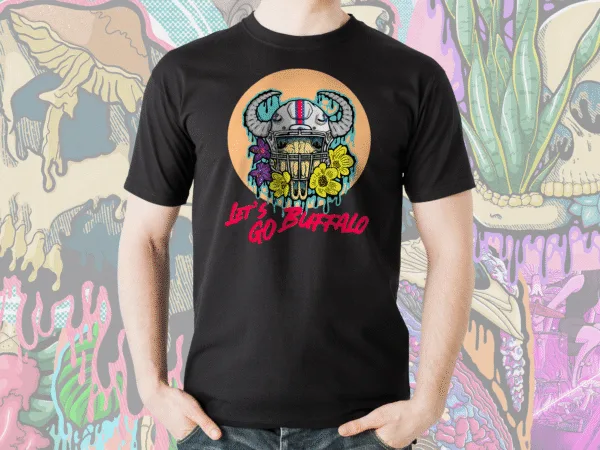 Let's Go Buffalo! Drippy Bison Skull tee in black, featuring a football helmet skull with Buffalo horns and florals, perfect for sports fans.