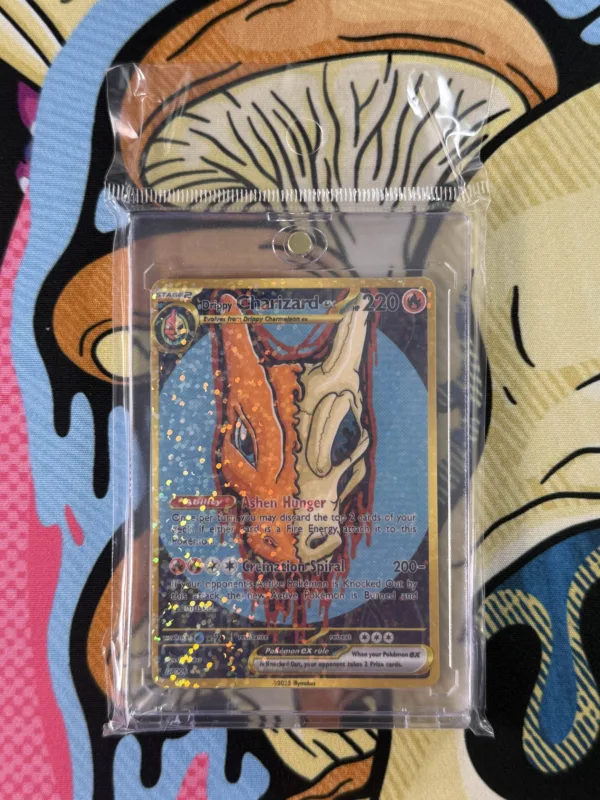 Drippy Charizard EX card featuring creepy skull dragon design, gold-style border, and holographic finish sealed in magnetic slab in packaging