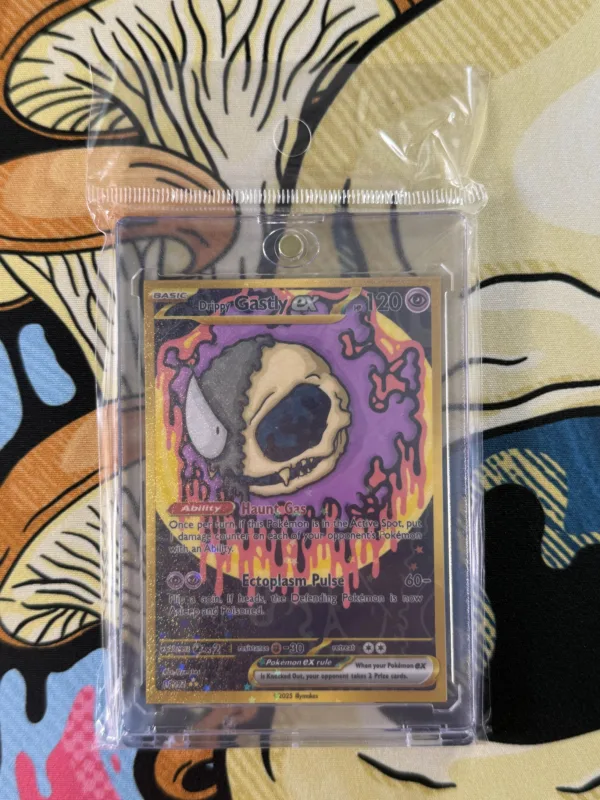 Drippy Gastly EX custom Pokémon card with ghost skull design and holographic finish sealed in magnetic slab case