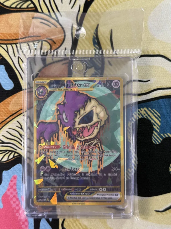 Custom Drippy Haunter EX card with skull ghost art, full art gold design, and holographic shine sealed in slab