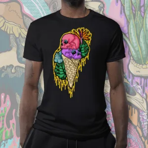 Unisex cotton t-shirt with Drippy Ice Cream Skull 3 design — three colorful skull scoops in a melting ice cream cone with tropical leaves and orange garnish, styled on a model against a vibrant illustrated background.