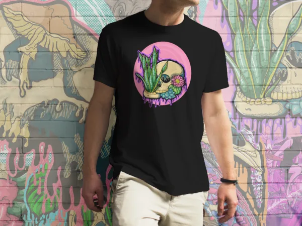 Drippy Succulent Skull graphic tee in black, featuring a surreal melting skull with snake plants and succulents growing from it.