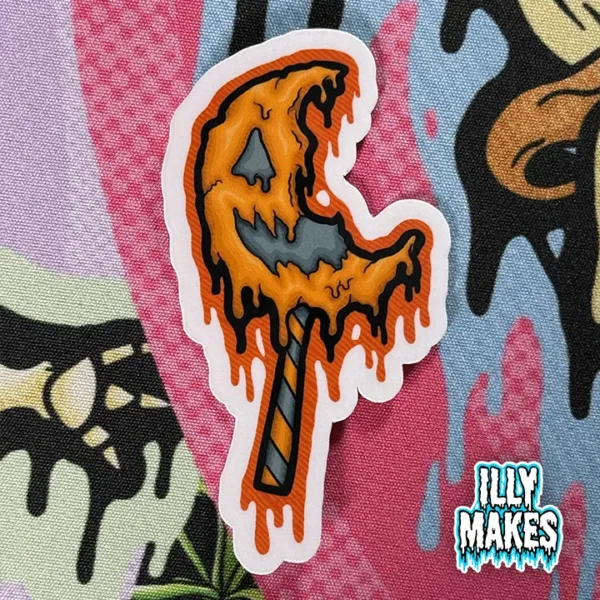 Drippy Trick ’r Treat Sam Lollipop Sticker — original horror art by illymakes. A creepy melting jack-o’-lantern design for Halloween lovers and horror fans.