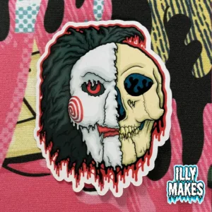 Drippy Jigsaw Puppet Skull sticker, original illymakes horror art. A melting skull and puppet design with eerie red drips.