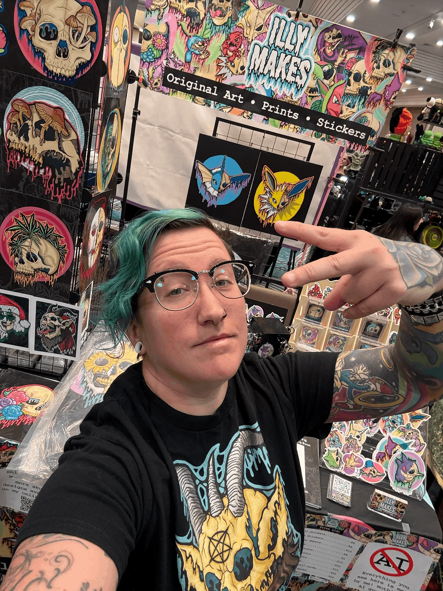 Me standing in front of my artist alley booth.