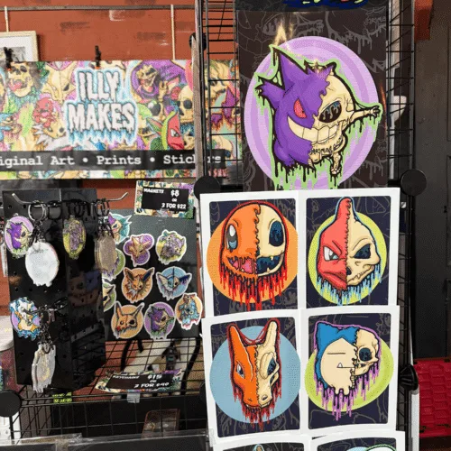 Some of my small paintings, keychains, and small and large art prints.