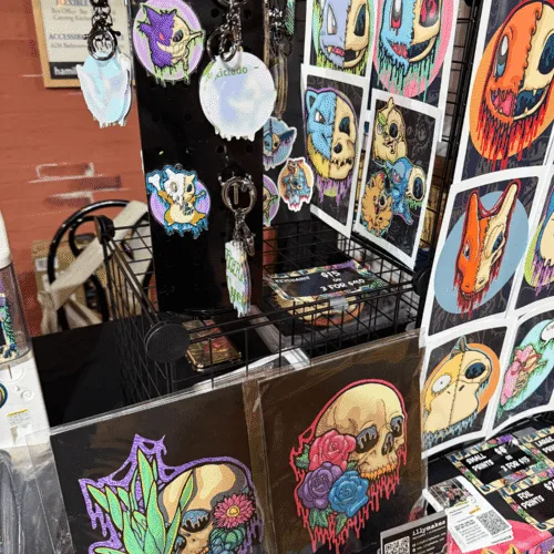 Some of my small paintings, keychains, and small art prints.